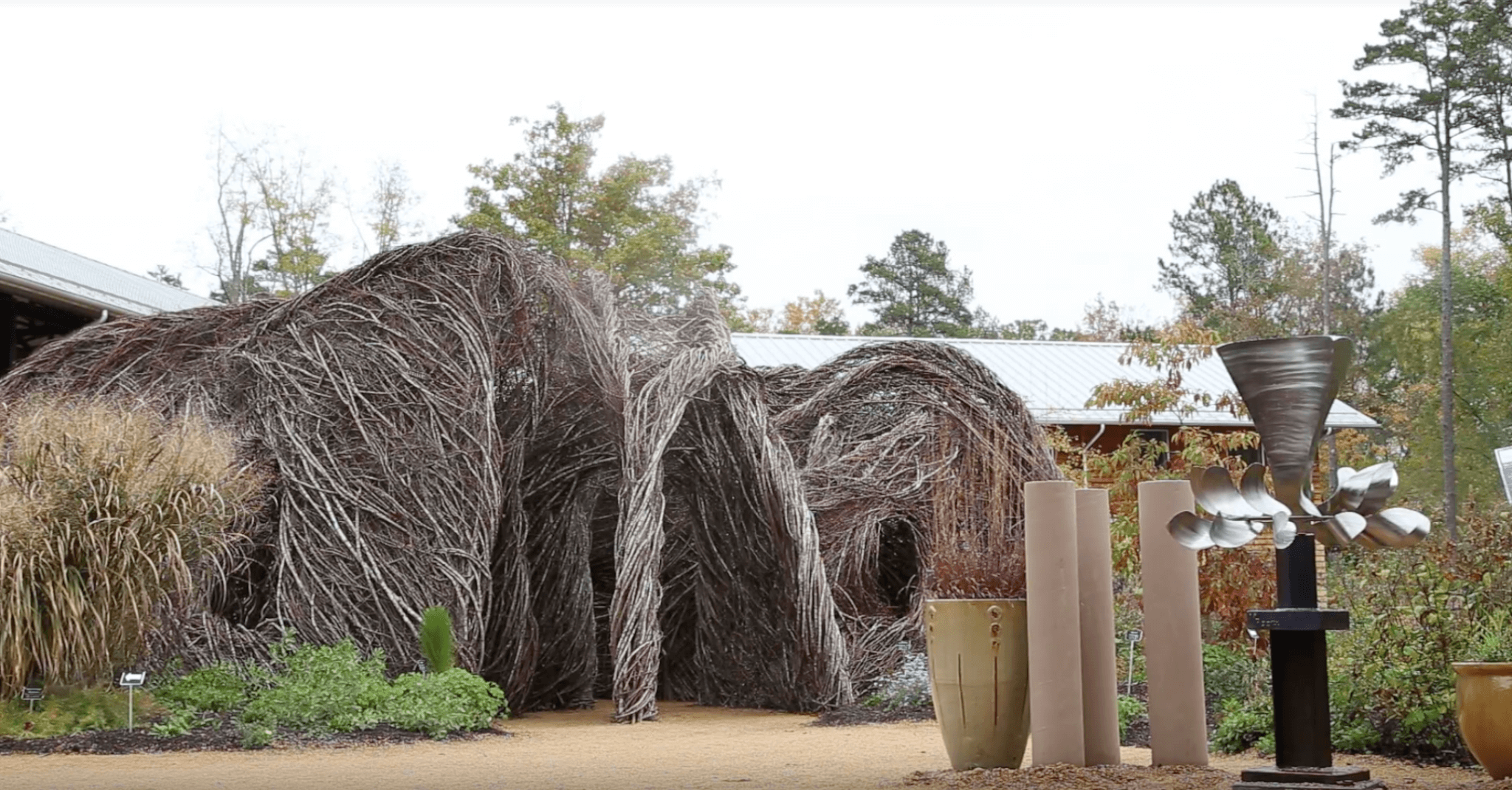 Photo of the completed sculpture by Patrick Dougherty at the North Carolina Botanical Gardens.