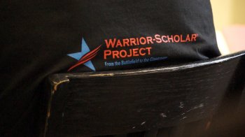 A close up of the Warrior Scholar Project logo on a t-shirt
