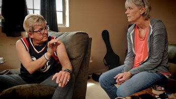 Carol Vanderzwaag talks with patient