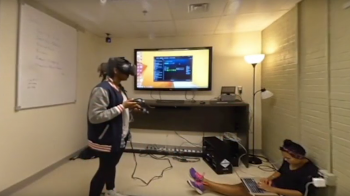 Students use virtual reality equipment.