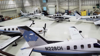 Planes in a hangar.