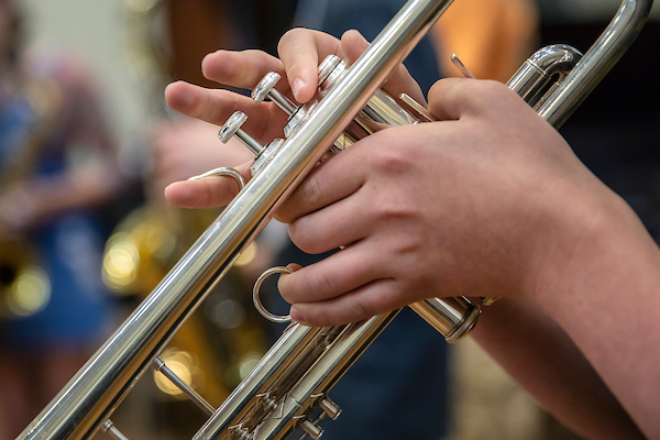 A student plays the trumpet.