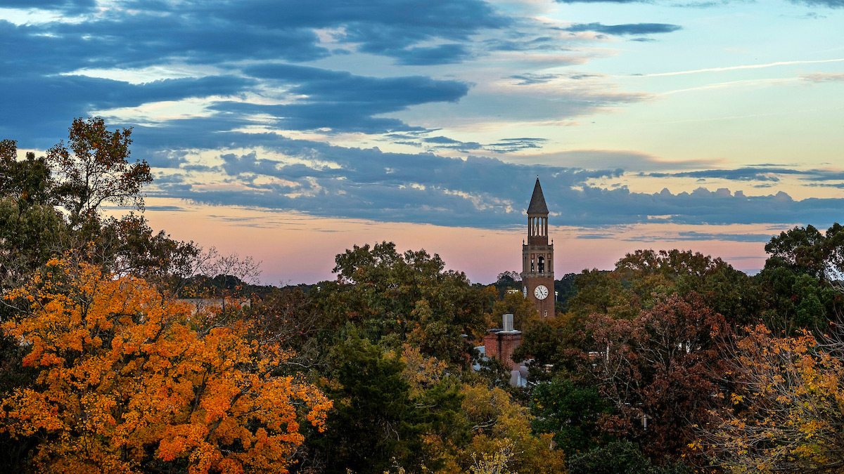 An overall photo of the UNC-Chapel Hill campus at sunset.