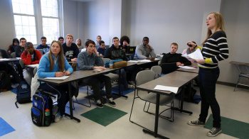 Student gives presentation in front of class