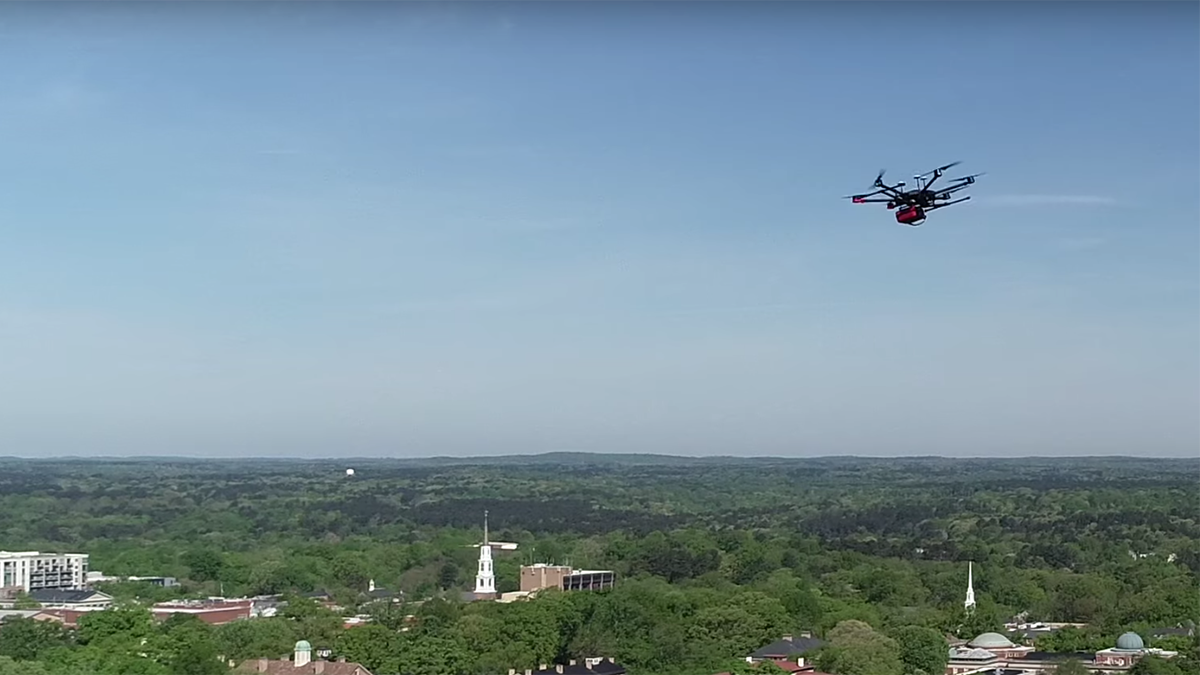 A drone flys over campus.