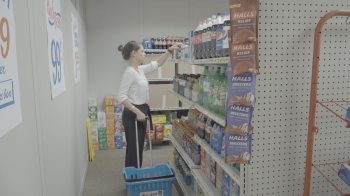 A woman shops in the UNC Mini-Mart