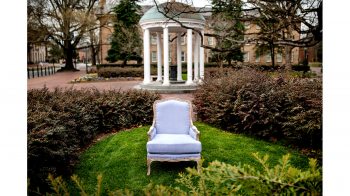 A Carolina blue chair in front of the Well.