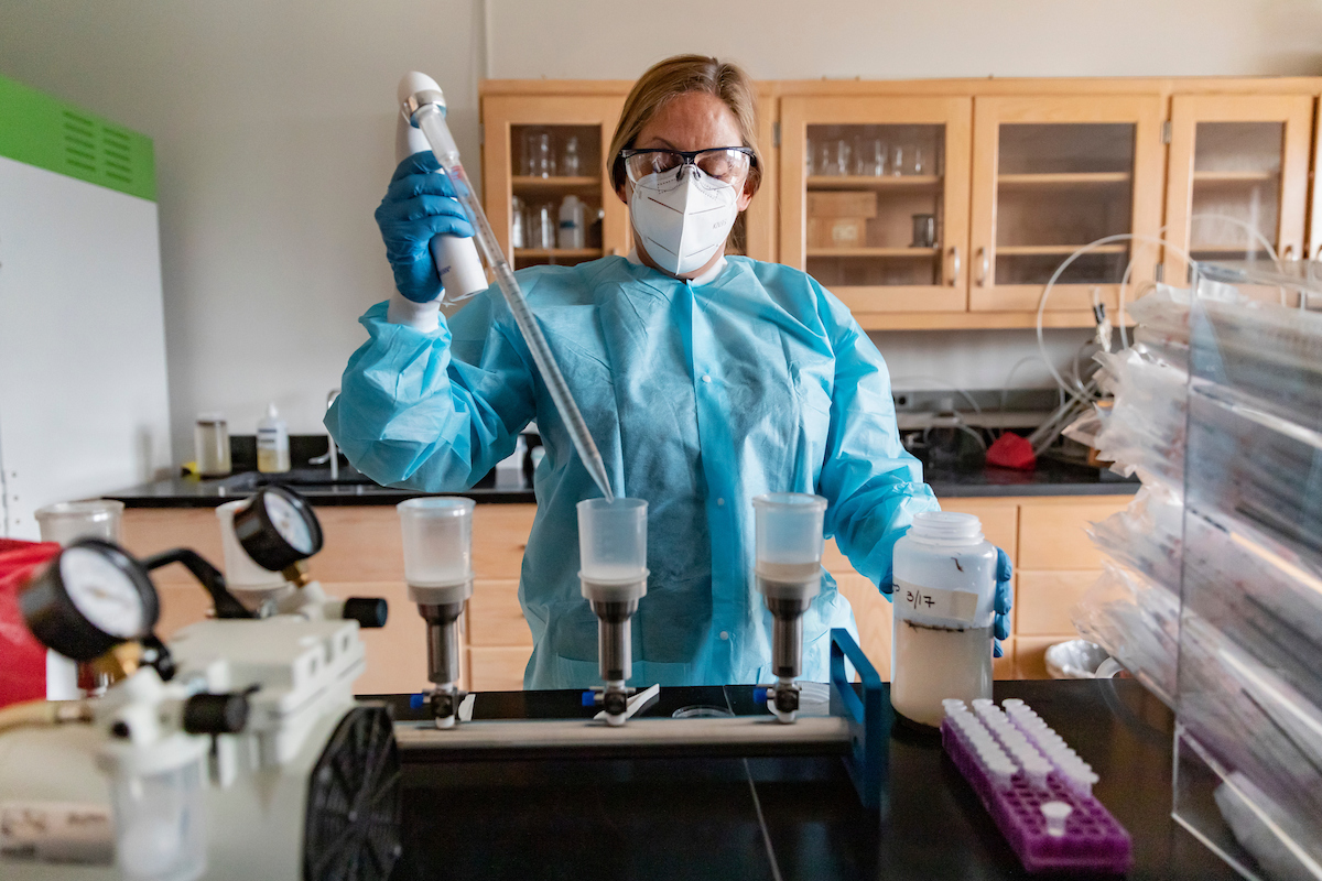Rachel Noble in her lab testing water samples.
