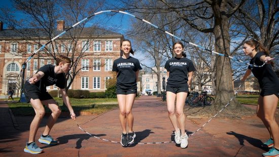 Students jump roping on campus.