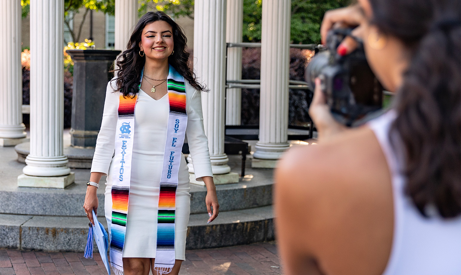 A UNC student wearing an Exitos graduation stoll.