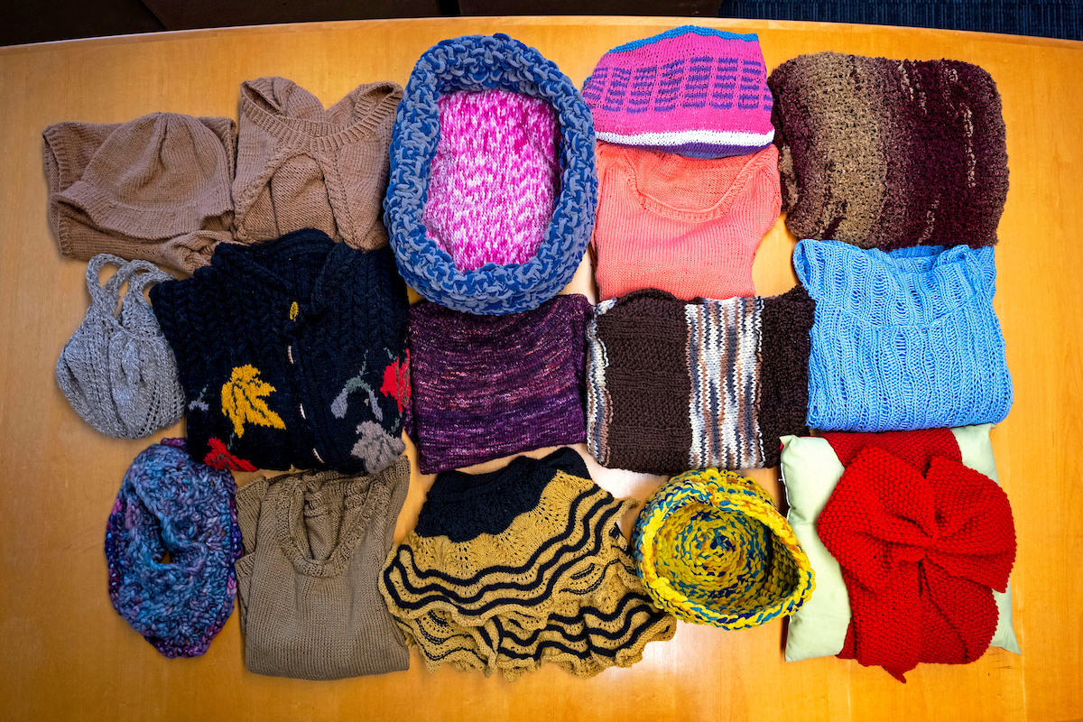 a collection of knitted items