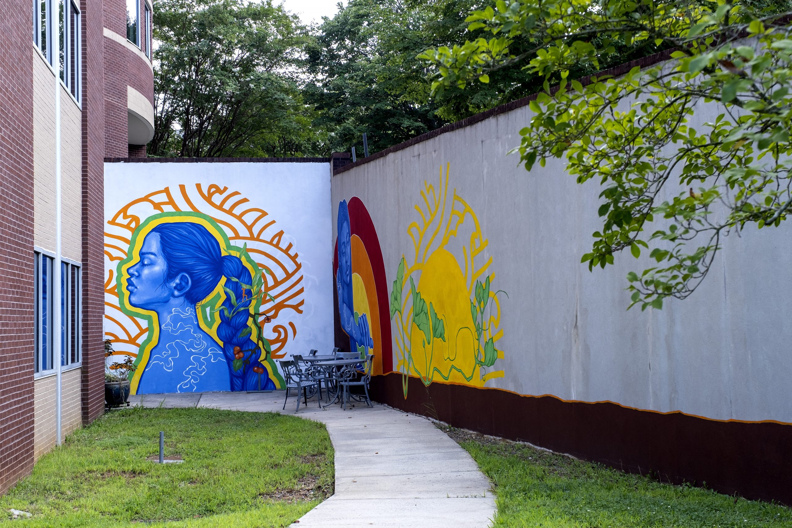Outdoor courtyard and mural at Center for Health Promotion and Disease Prevention.