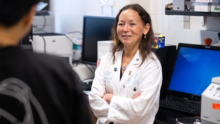 A scientist in a lab coat.