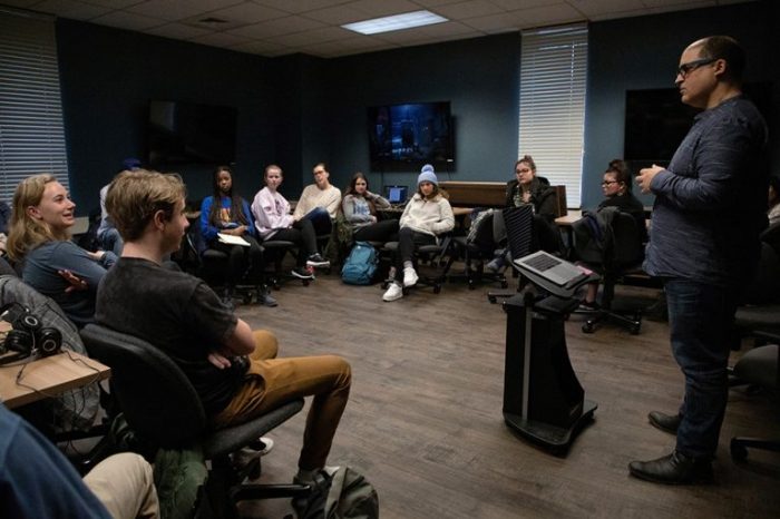 Guillermo Rodríguez-Romaguera leads a class discussion after students played the video game “Layers of Fear” in their English and comparative literature class on Jan. 31, 2020. (Megan May/UNC Research)