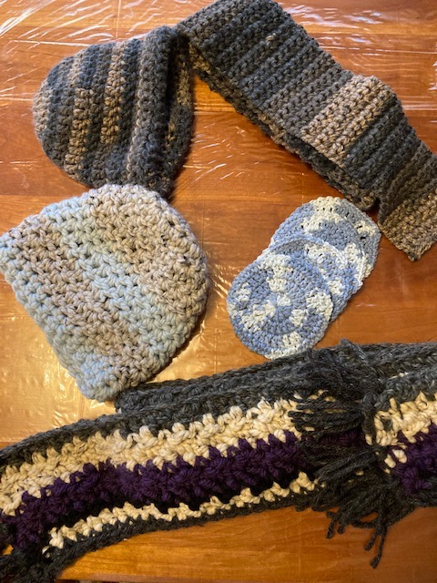 crocheted hats and scarves