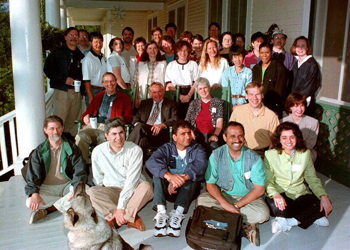 Participants in the first Tar Heel Bus Tour in May 1997 gather on the front porch of the Balsam Mountain Inn. (Dan Sears/UNC-Chapel Hill)