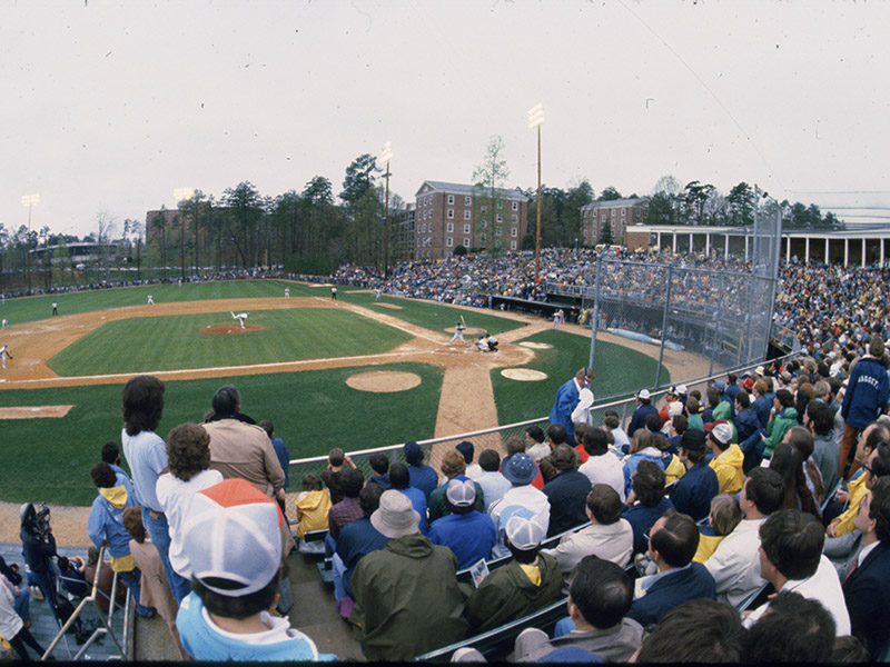 The 1979 baseball game between U.N.C. and the New York Yankees in Boshamer Stadium. A view from the third base bleachers showing the crowd of 7,000 and the players on the field.