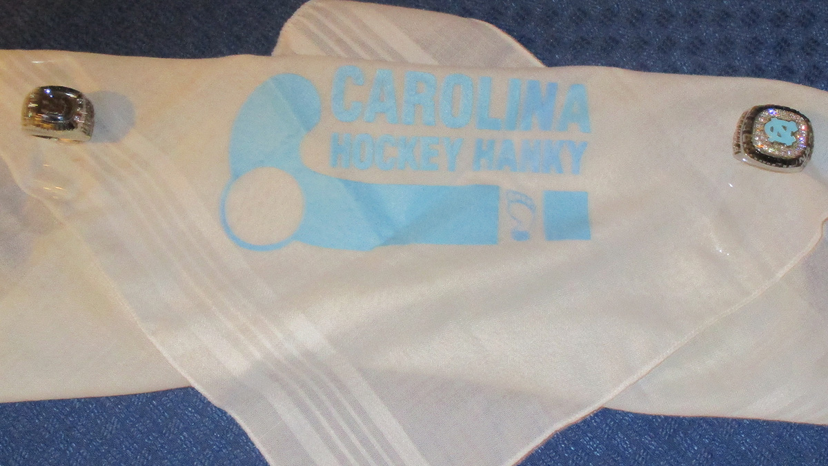 One of Brooks's hockey hankies with his two N.C.A.A. championship rings.