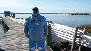 a housekeeper at the UNC Institute of Marine Sciences and super fan of Carolina football