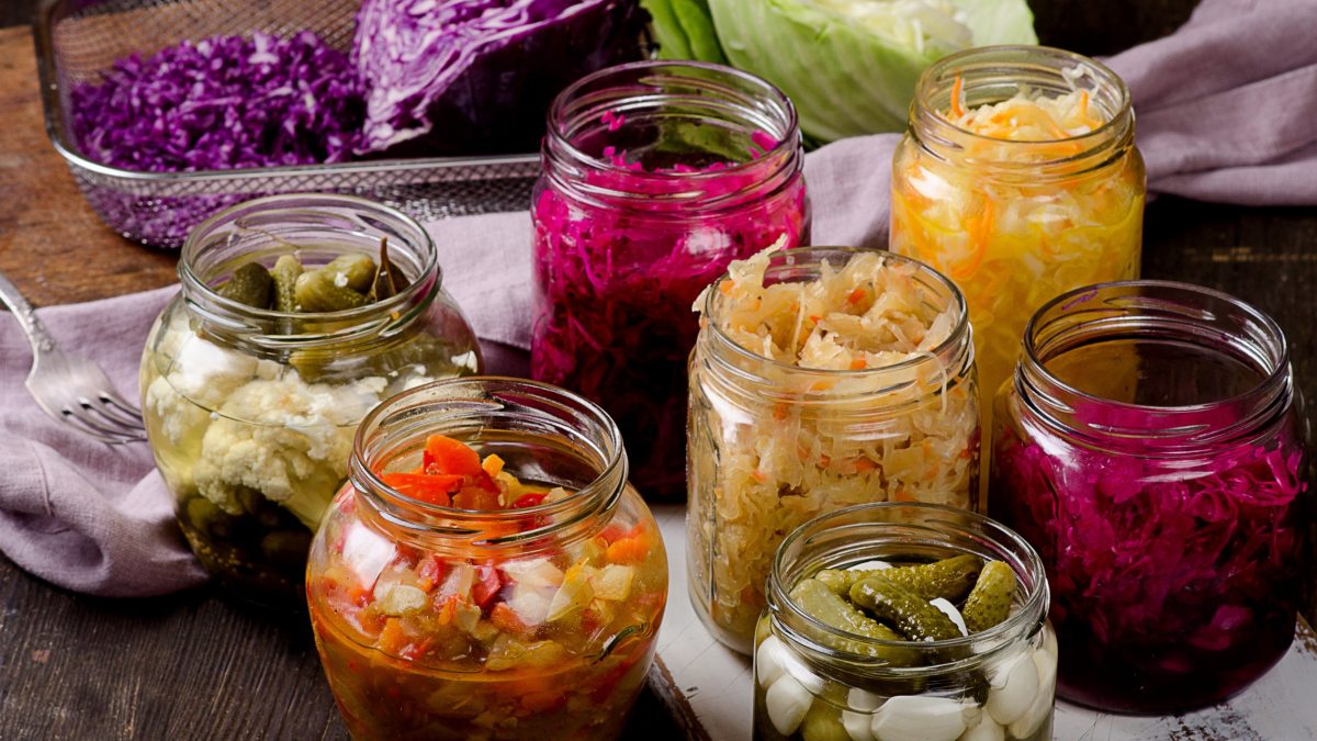 multiple jars of pickled food items