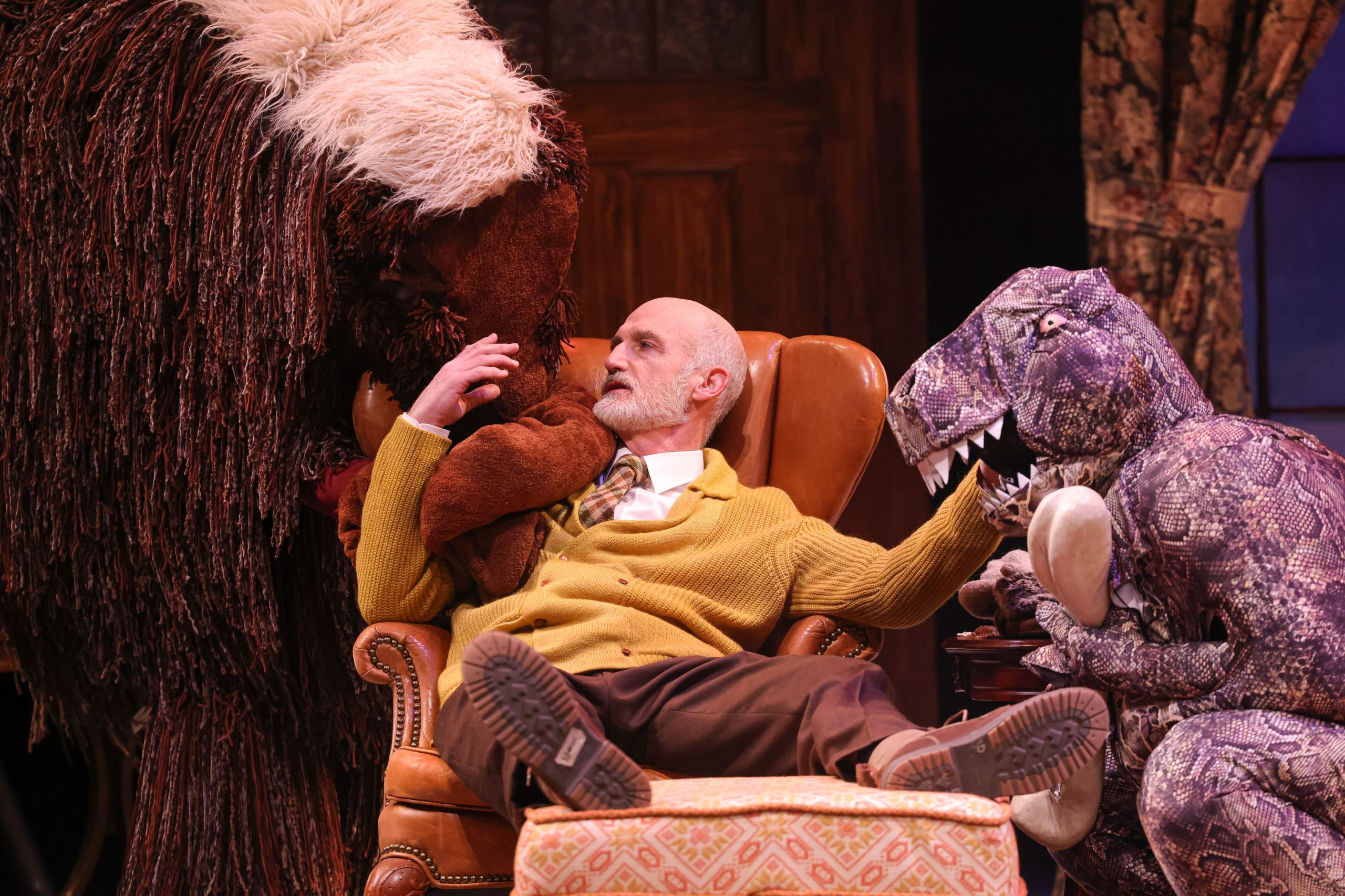A wooly mammoth and a dinosaur make an appearance in Act 1 of the play.