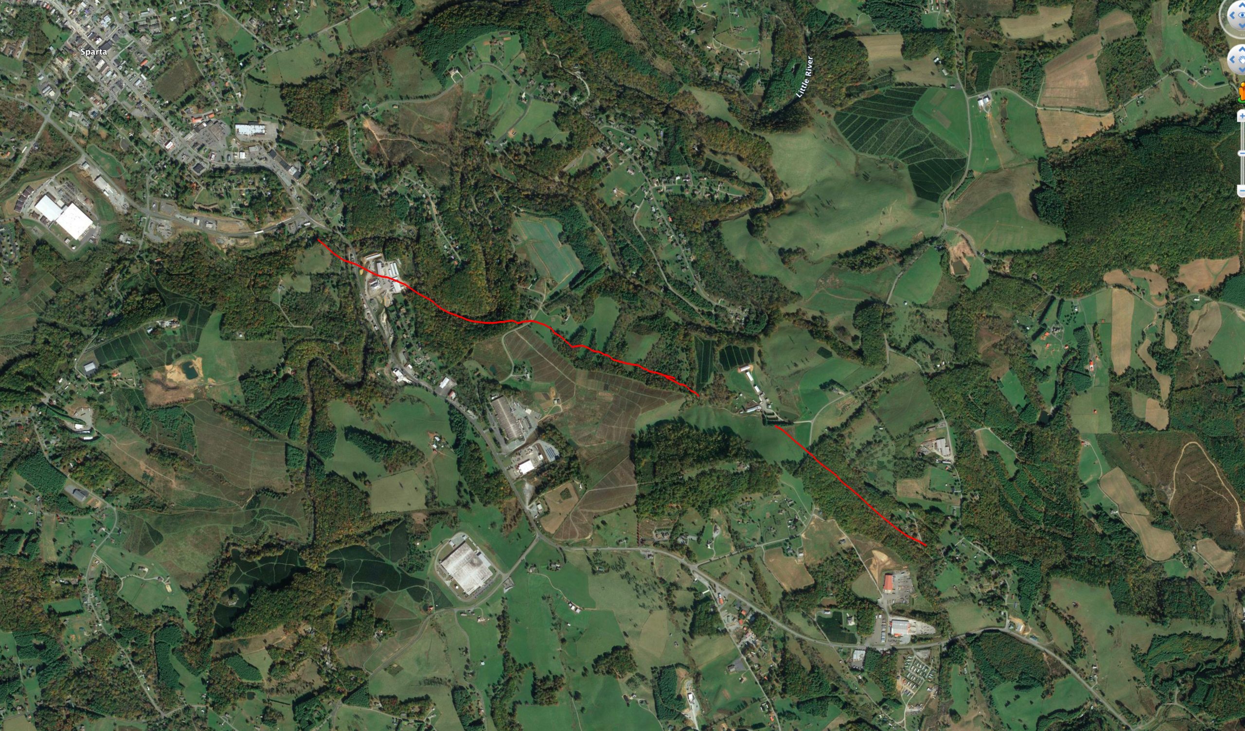 A segment of the fault mapped by Stewart, a 1.2-mile arc curving northwest from Sparta southeast toward Glade Valley. 