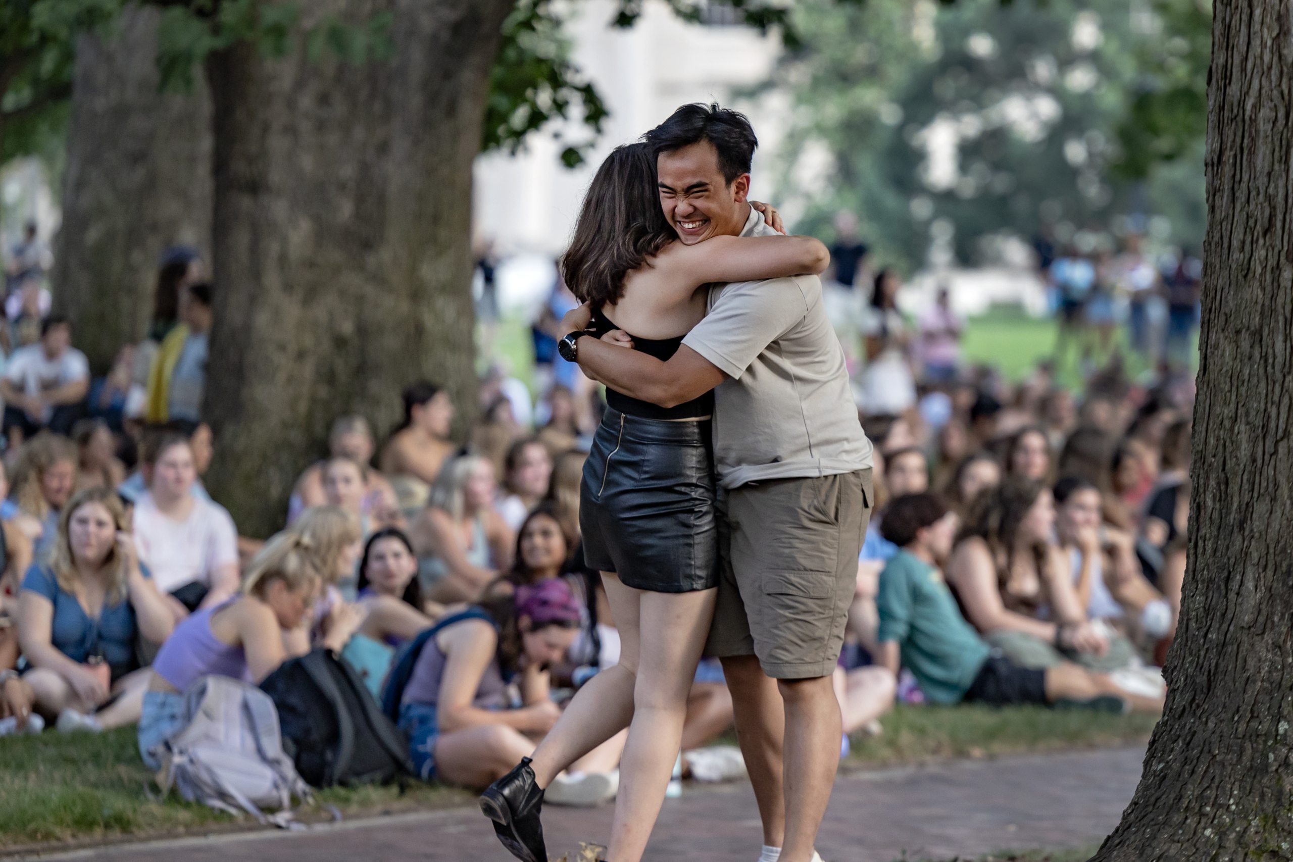 Two students hugging on Polk Place at the campus of UNC-Chapel Hill.