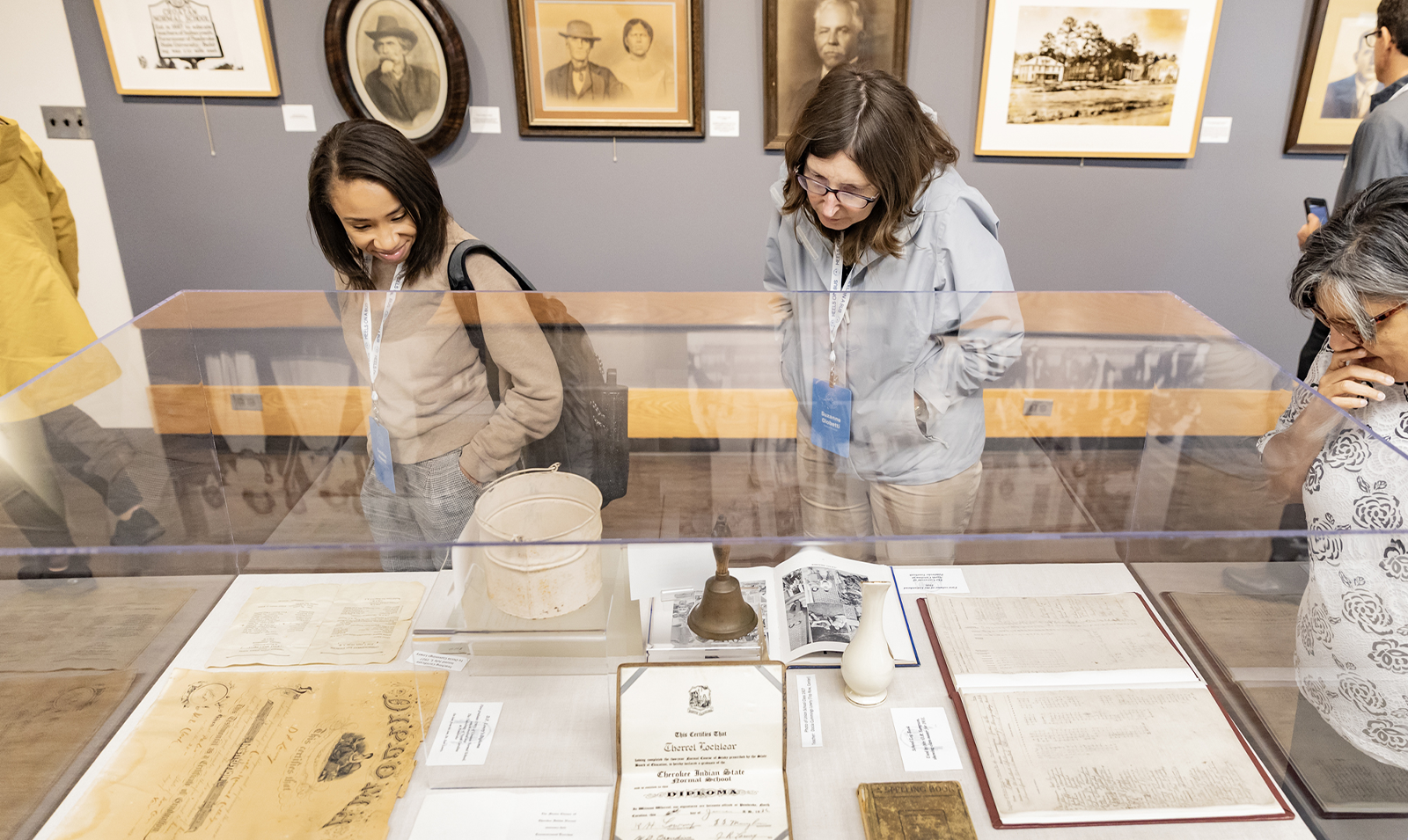 Two participants looking at exhibits at the Museum of the Southeastern American Indian.