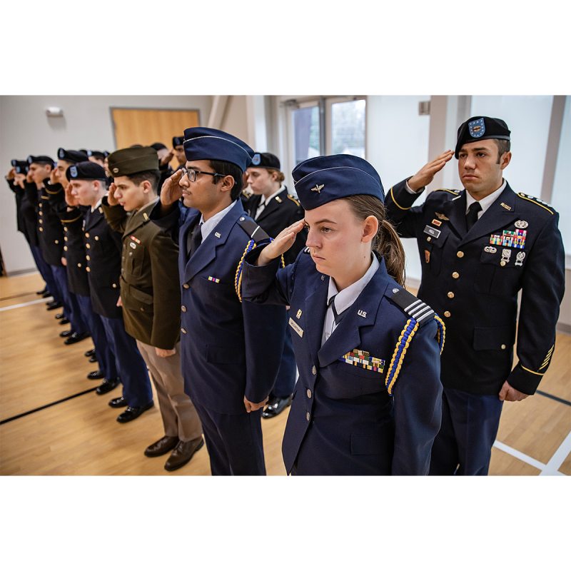 UNC ROTC members salute during the pledge of allegiance.