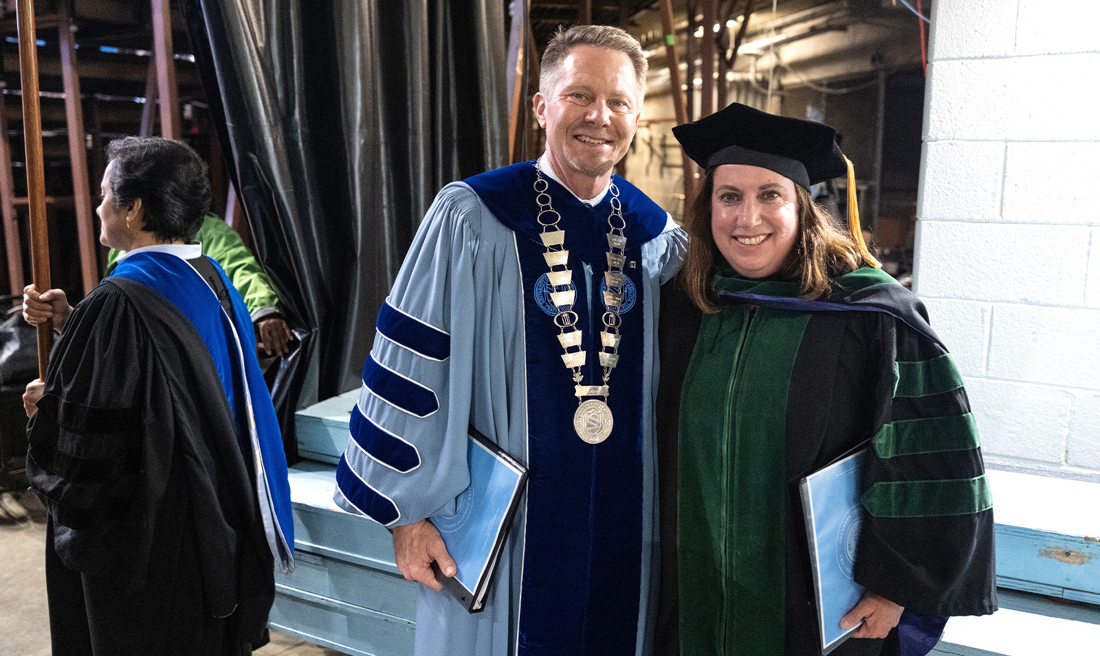Kevin M. Guskiewicz and Dr. Samantha Meltzer-Brody posing for a photo together.