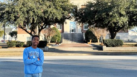 Ja'Khari Bryant standing across the street from a courthouse.