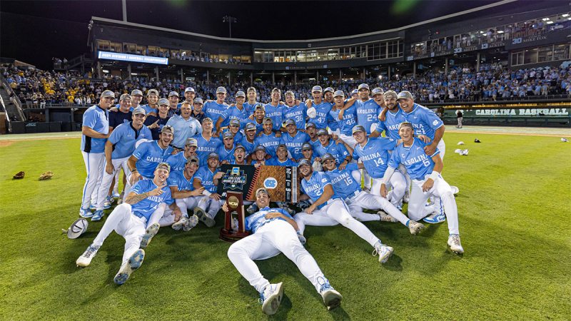 The Carolina baseball team posing for a group celebration photo at Boshamer Stadium