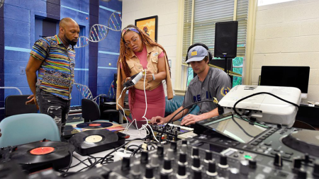 Professor Maya Shipman (Suzi Analogue) and another instructor work with a student in the Beat Lab at the Carolina Hip Hop Institute summer 2024.