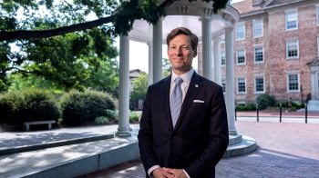 Lee H. Roberts in front of the Old Well