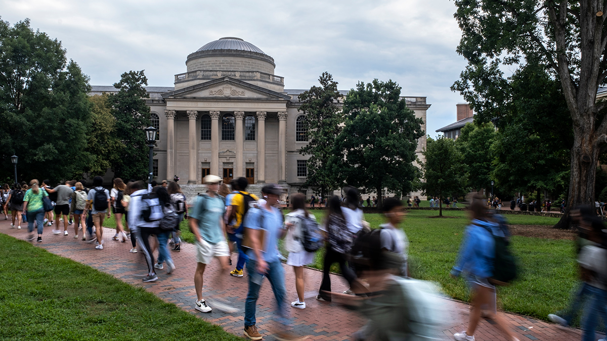 Students walking on the campus of UNC.