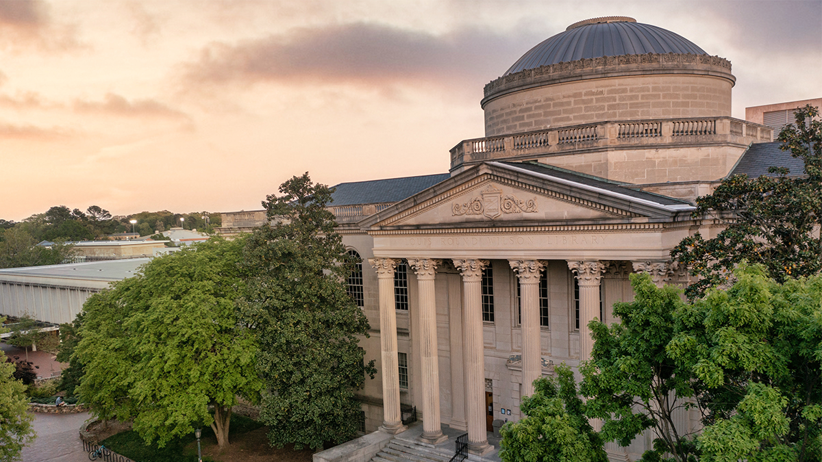 Exterior image of Wilson Library at dusk.