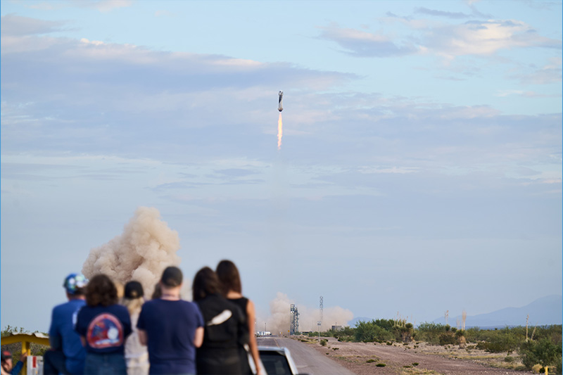 A space shuttle blasting off.