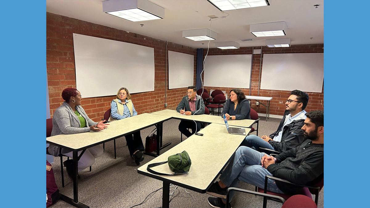 Hammad Nadeem, Abdur Rahman and Senior Program Manager Christina Theodorou discuss the Liberty co-packing facility project with stakeholders.