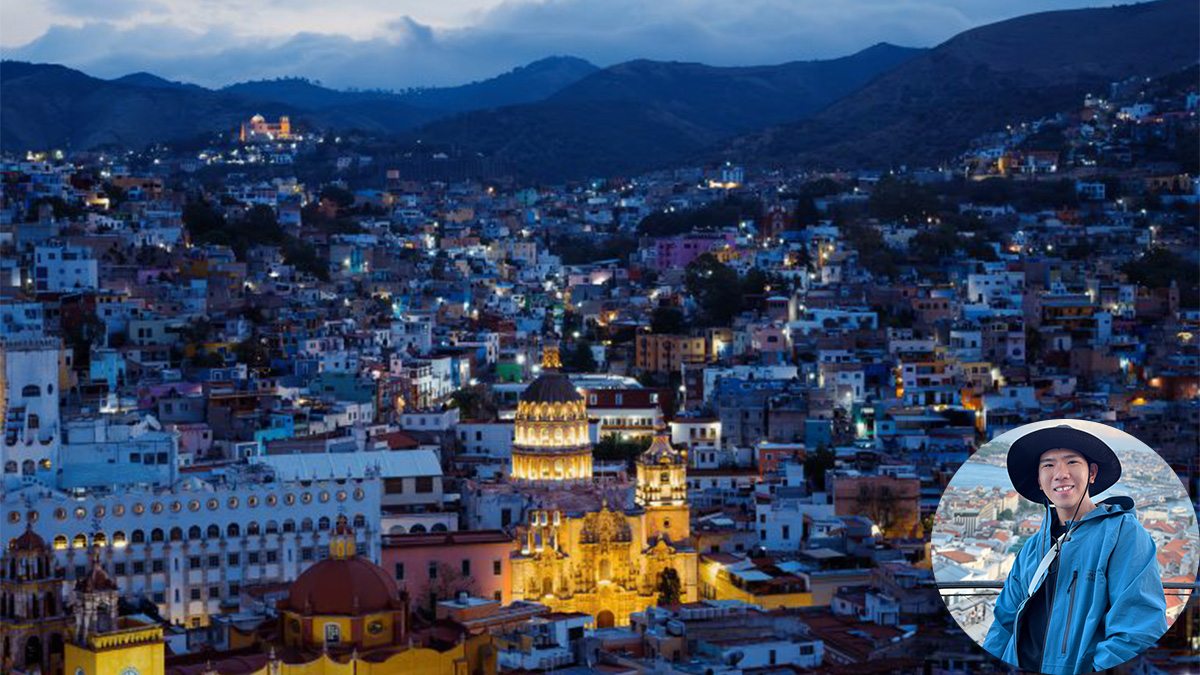 City scape of Guanajuato at dusk. A close-up picture of Zheyu Huang is overlayed in the bottom right corner.