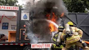 Fire fighters putting out a fire demestration.