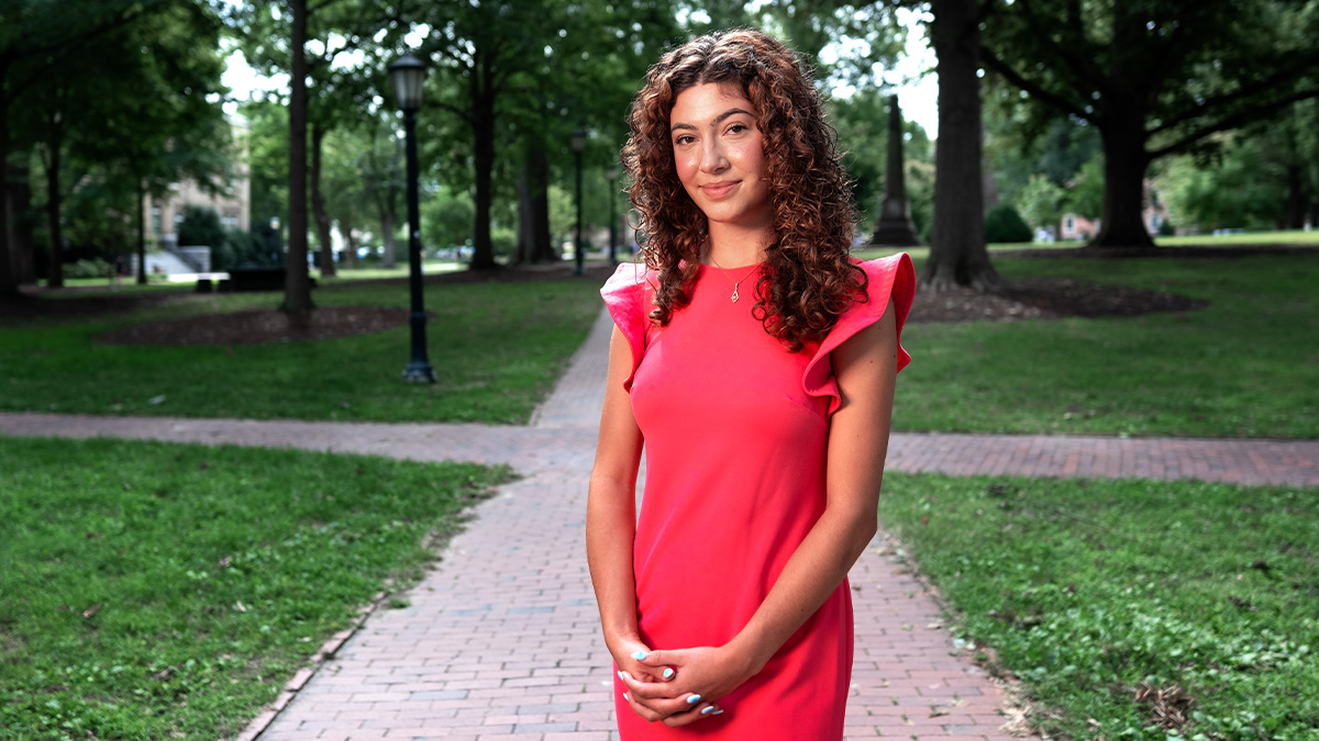 Portrait of Carolina first-year student Tazanna Jones on McCorkle Place on the University's campus.