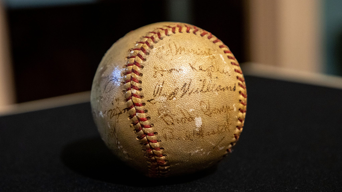 Ted Williams baseball, used while he was in UNC's Navy Pre-Flight School, on view in Wilson Library