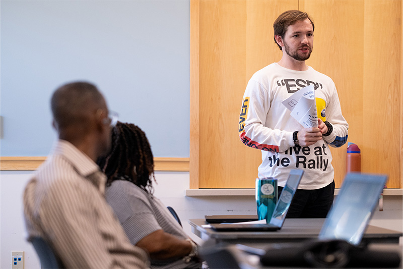 A UNC-Chapel Hill student instructor, Jed Edwards, speaking to library patrons attending a workshop on digital literacy.