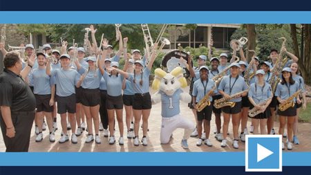 Carolina band poses with Rameses