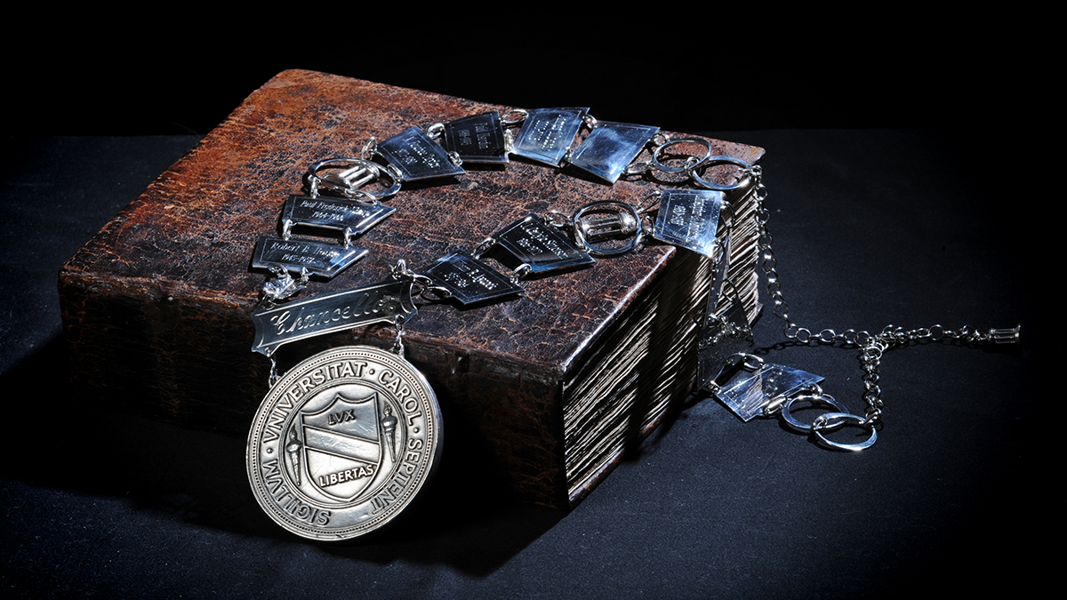 Chancellor's medallion placed over George Durant Bible with brown leather binding.