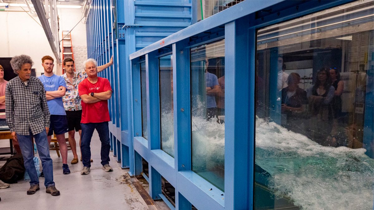 Roberto Camassa (left) and Rich McLaughlin (right) give a tour of the UNC Fluids Lab.