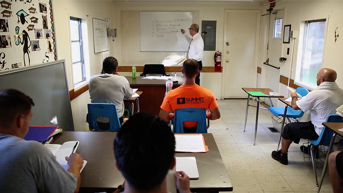 Photo of an instructor teaching in the Correctional Program.