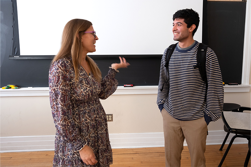 Heather Knorr talking with Daniel Gulisano at the end of class.