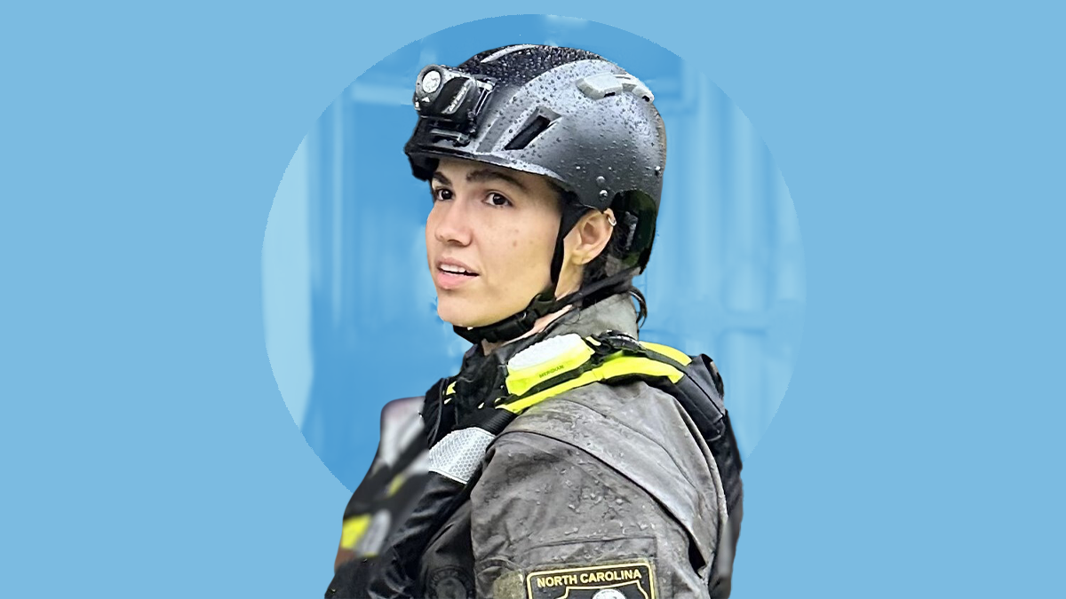 Photo of Dr. Mariecely Luciano-Feijoo in rescue gear placed above a Carolina Blue background.