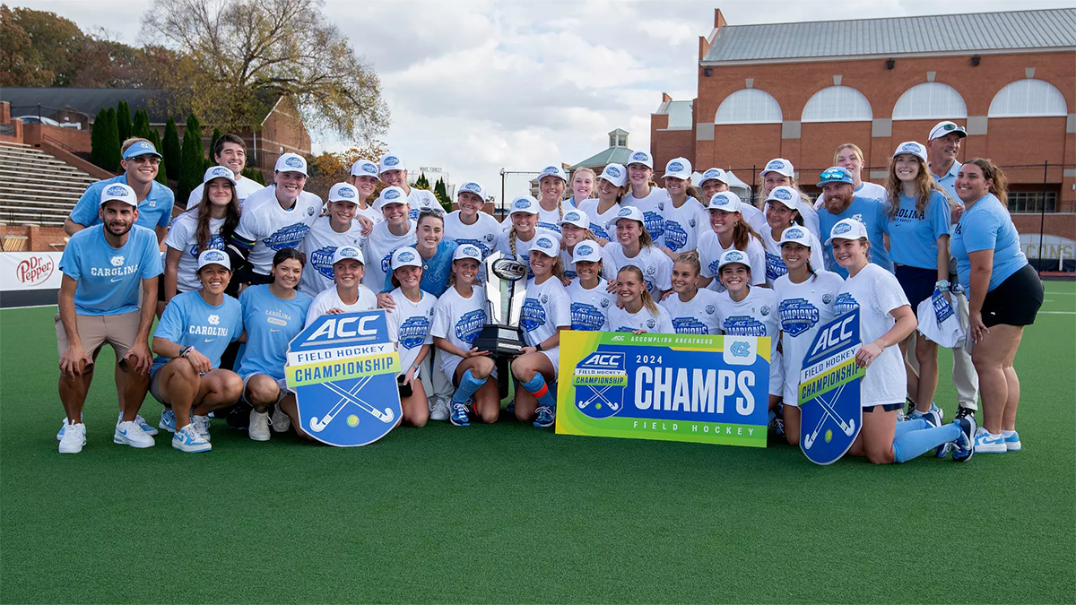 Team photo of Carolina field hockey after winning the ACC title.